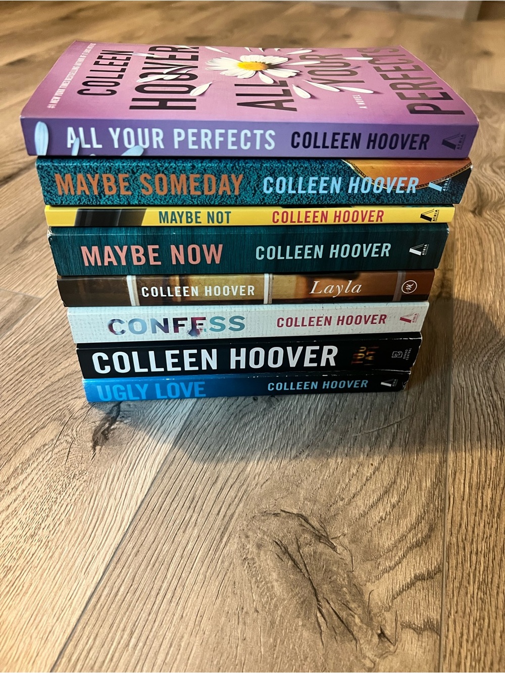 Colleen Hoover stack of books